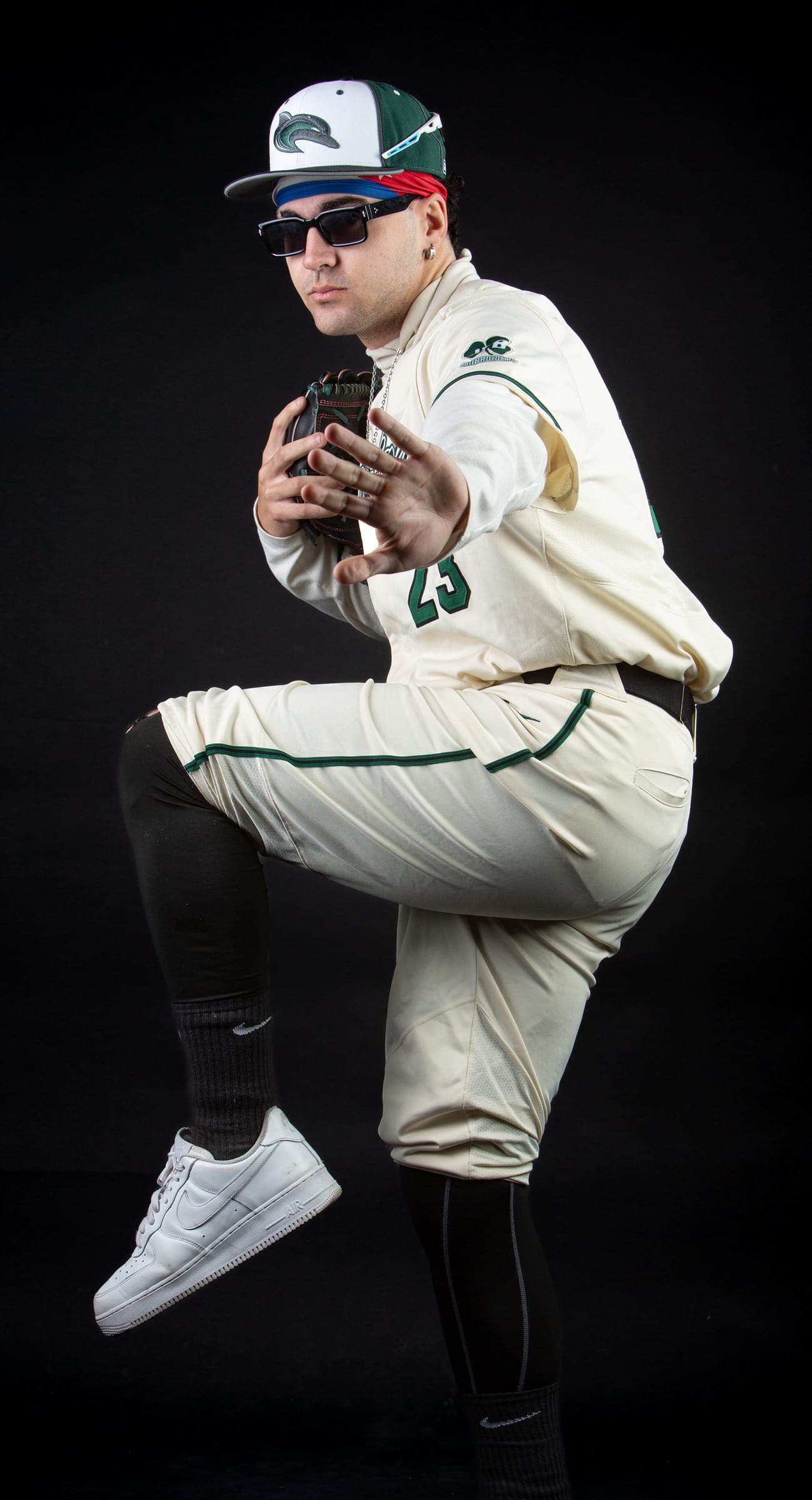 Shoreline pitcher posed in the middle of his windup