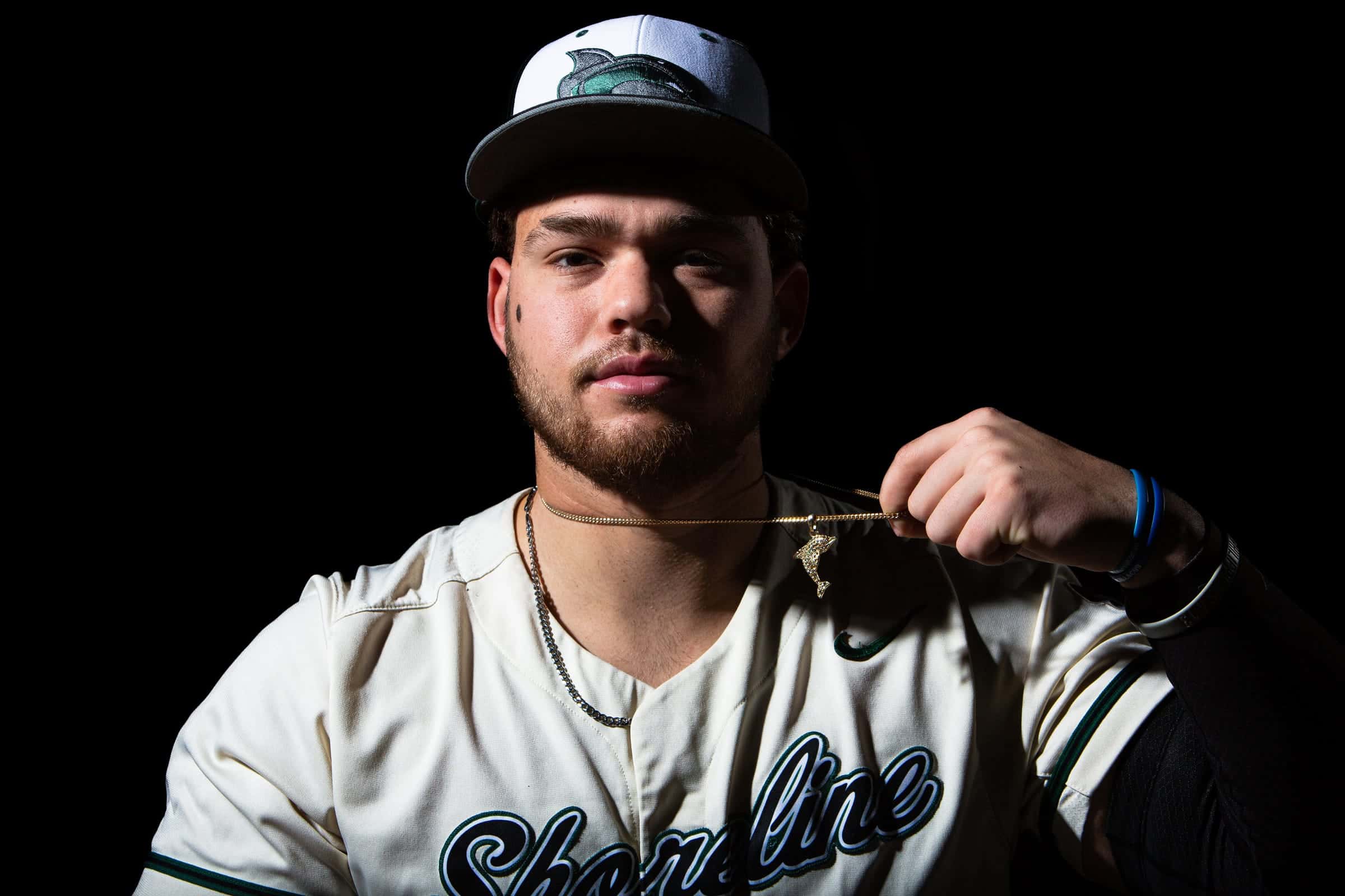 Shoreline player adjusting his chain in a close portrait